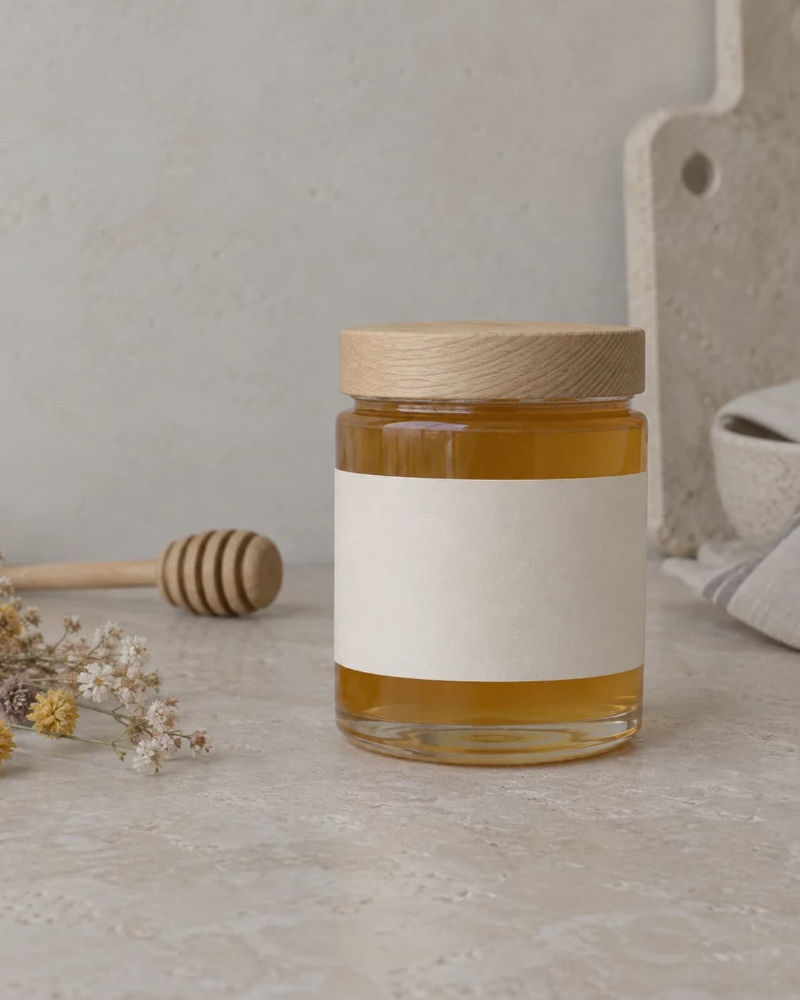 Artisan wildflower honey jar in a softly lit pantry still life