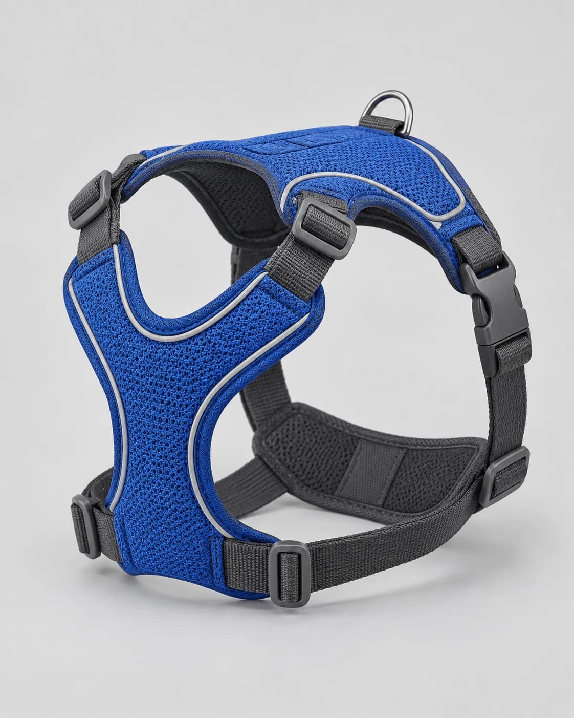 Cobalt technical dog harness in a clean ecommerce source photograph