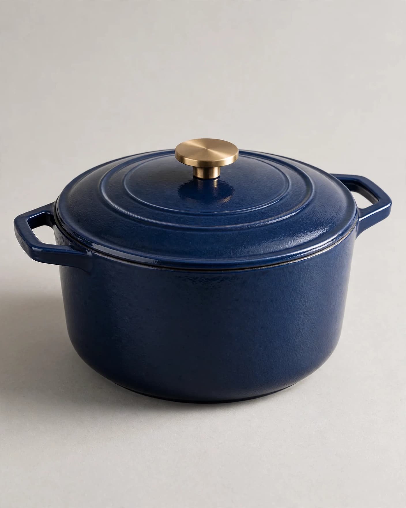 Same blue enameled Dutch oven in close-up detail and texture photography