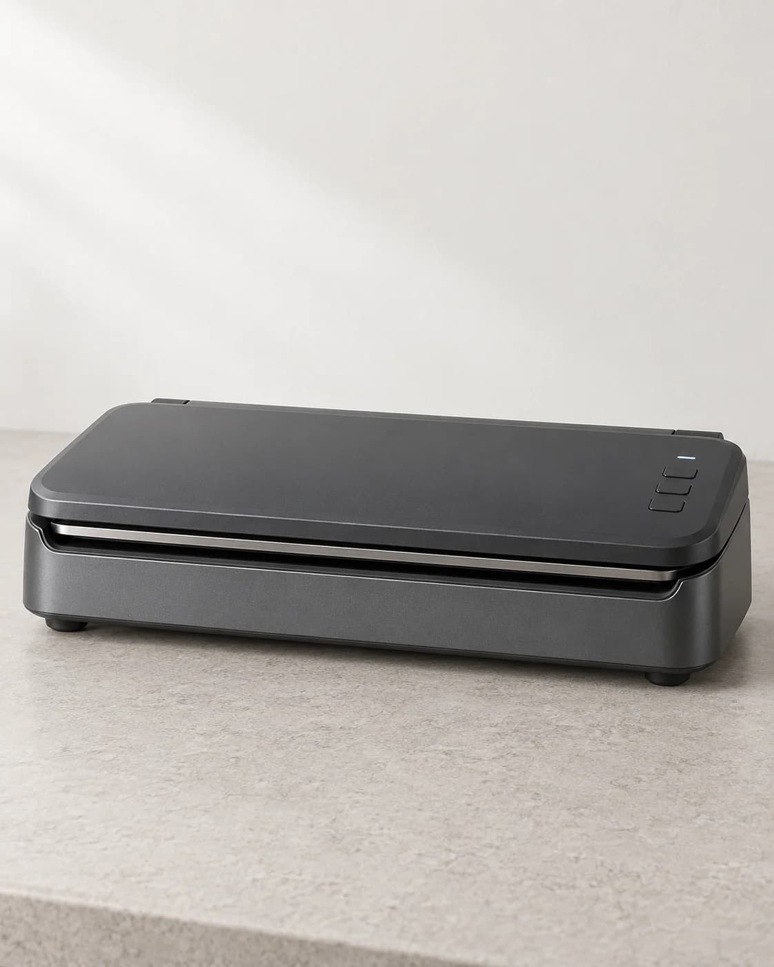Graphite countertop vacuum sealer in a clean seller product photo