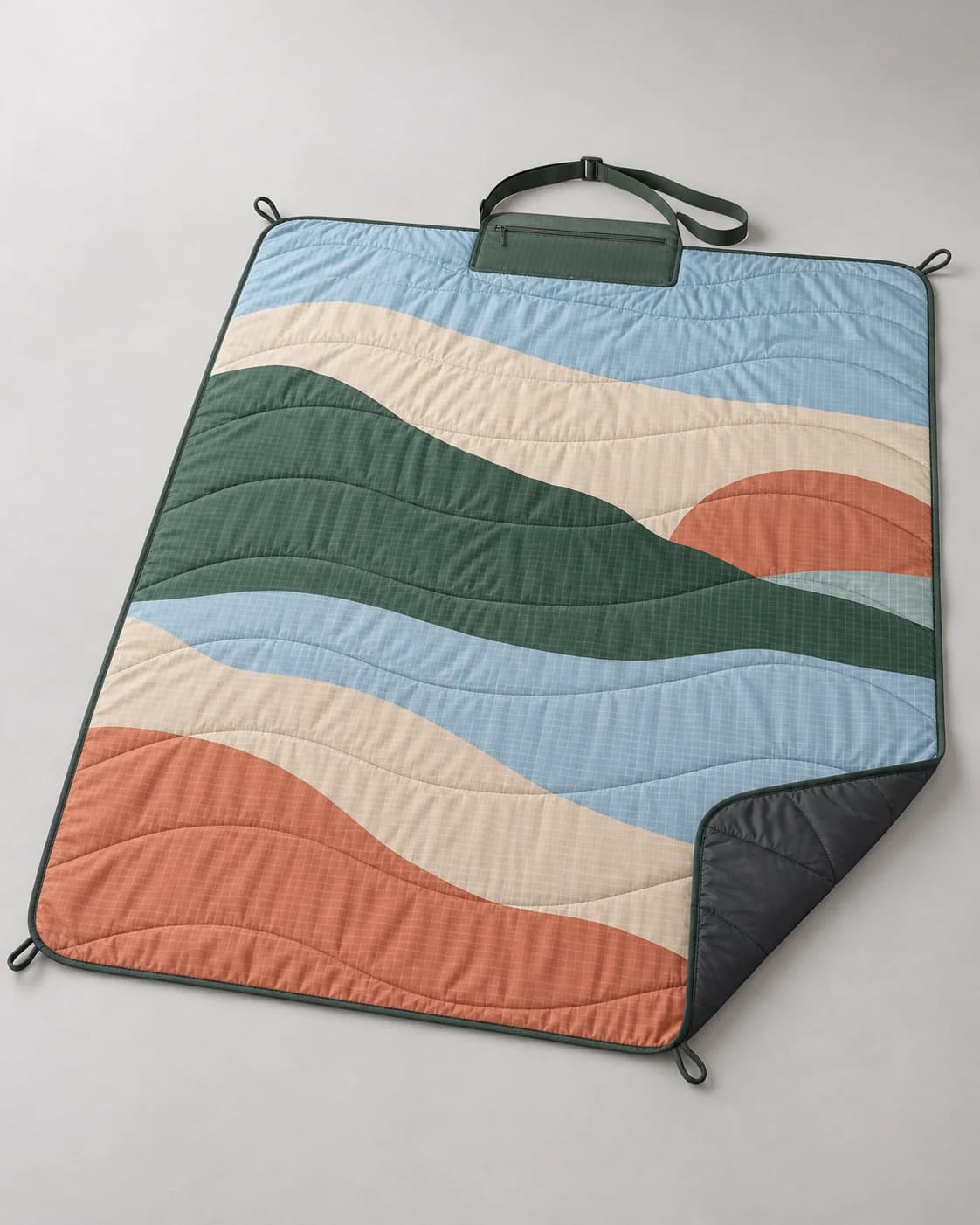Packable landscape-pattern picnic blanket in a clean seller product photo