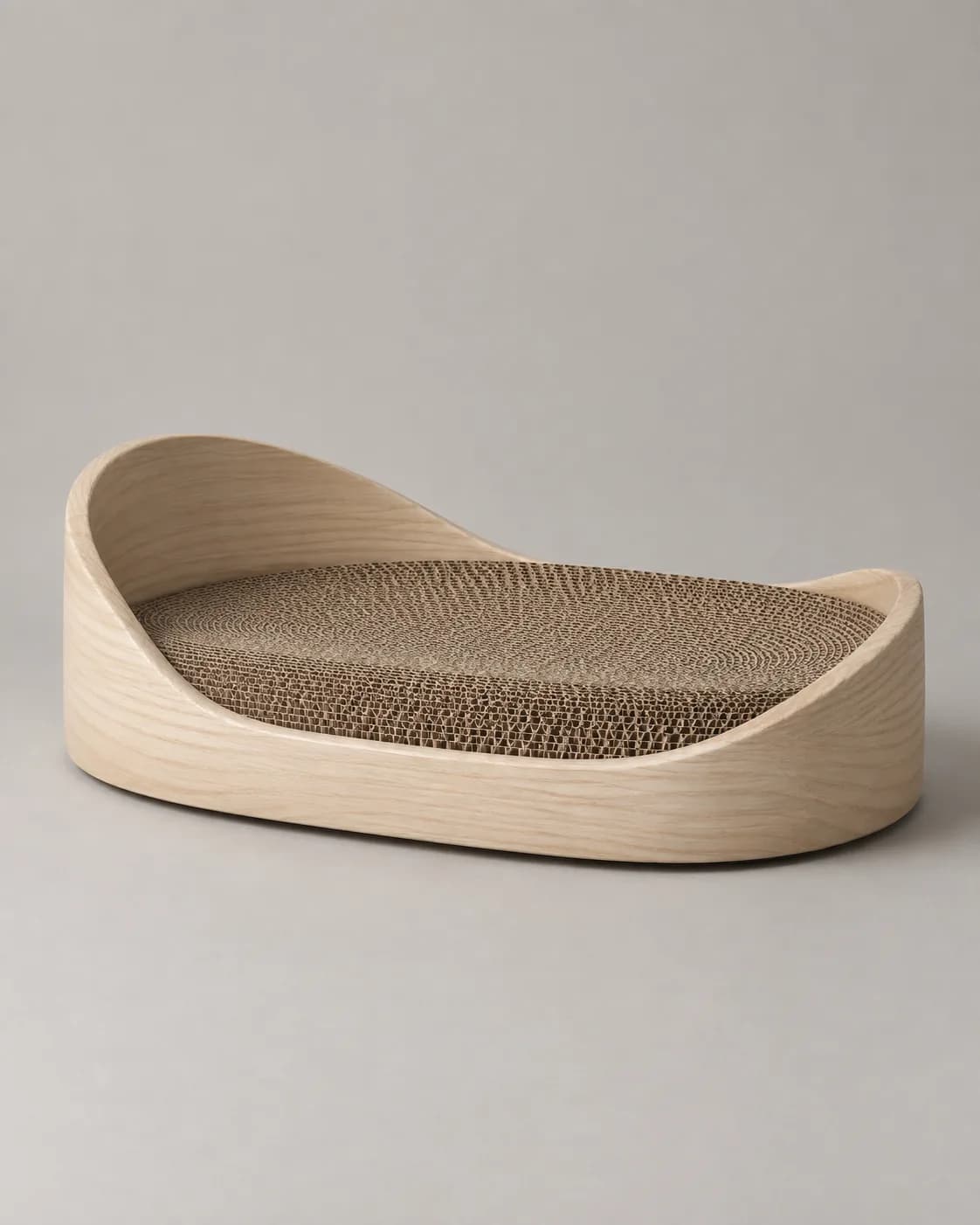 Sculptural pale-wood cat scratcher on a plain seller background