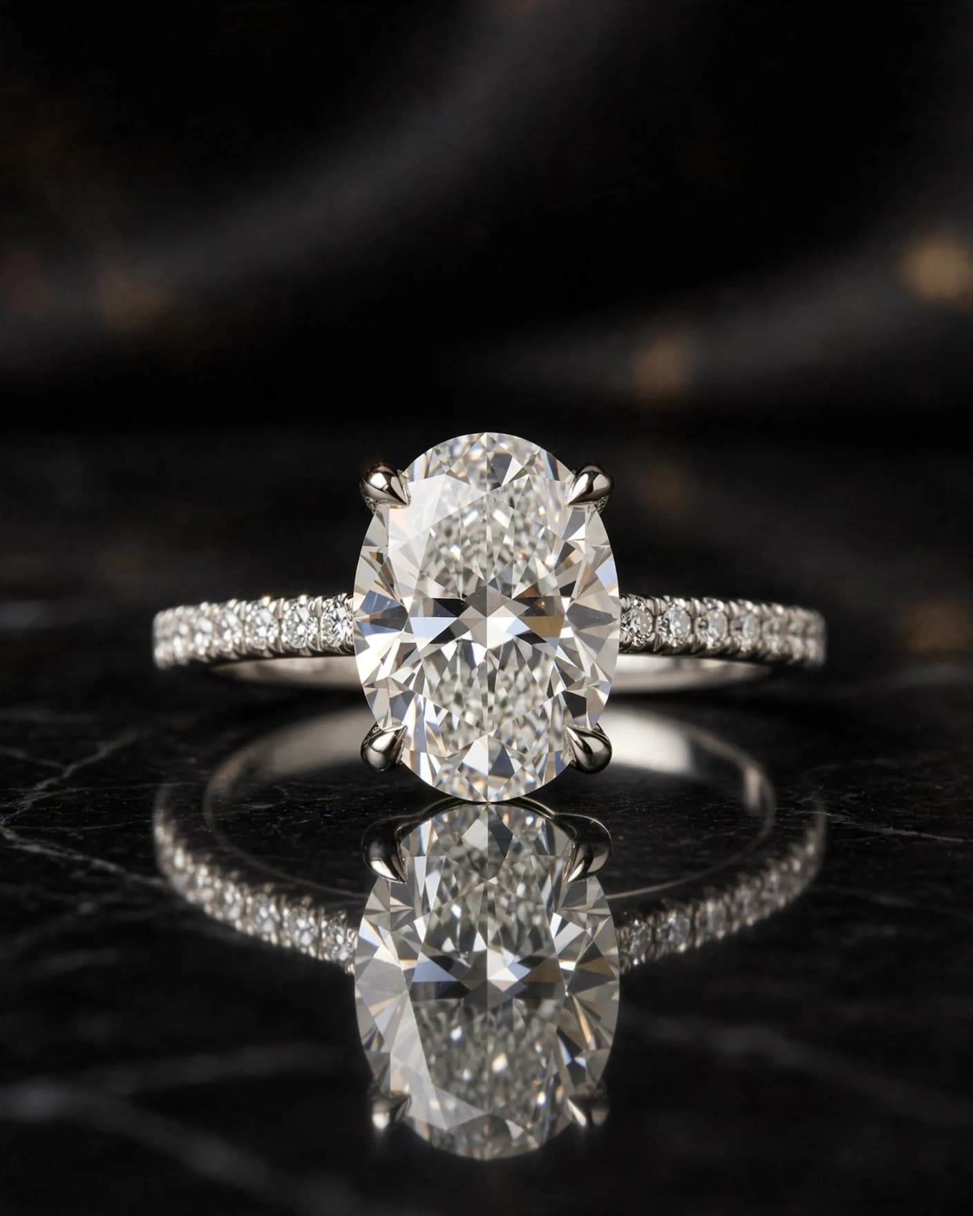 Same oval-cut diamond ring styled on dark polished stone with luxury lighting
