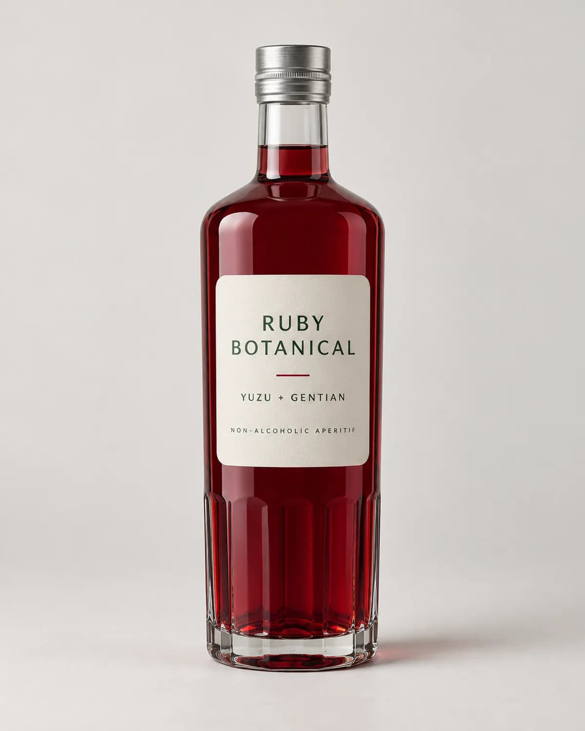Ruby botanical aperitif in a clear glass bottle in a clean ecommerce source photograph